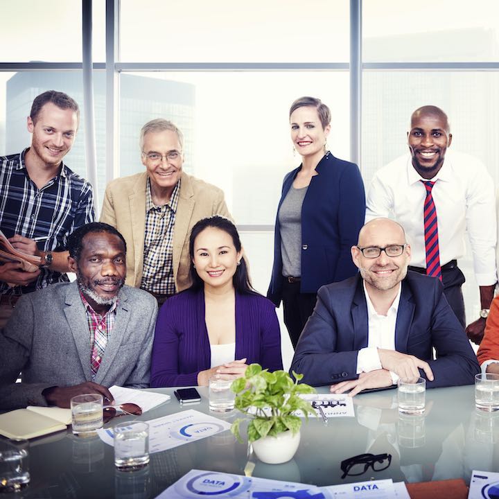 diverse group of businesspeople smiling